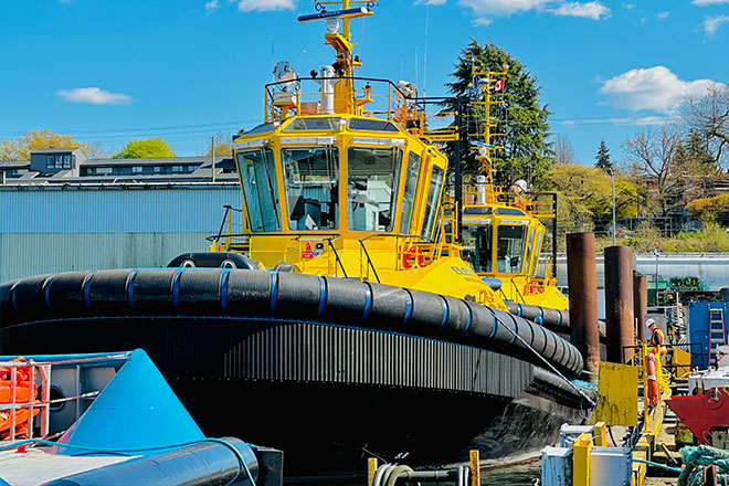 Two of SAAM's electric tugs at dock