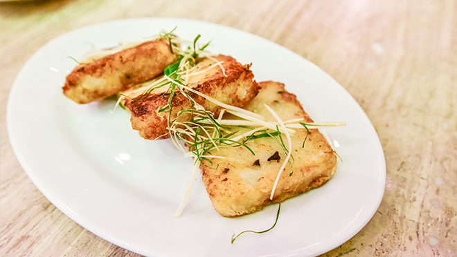 Photo of turnip cakes, a popular dish served in Cantonese cuisine