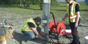 Site C preparation crew working on a pump