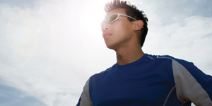 Man outside in the sun wearing sunglasses