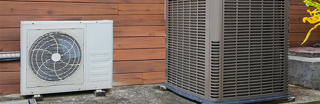 Photo of a ducted heat pump and a ductless heat pump