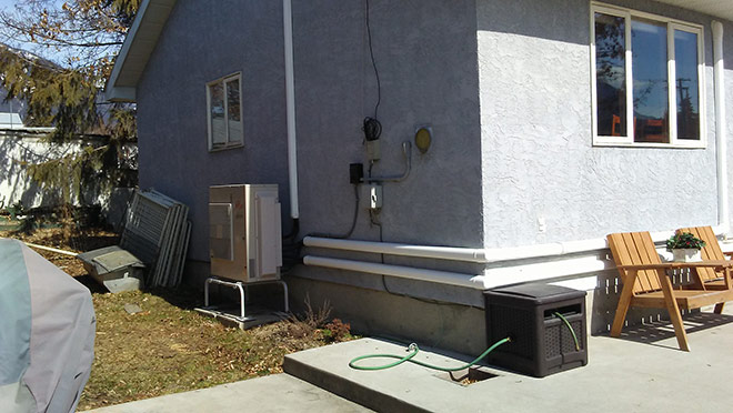 Image of a heat pump on a renovated Nakusp home