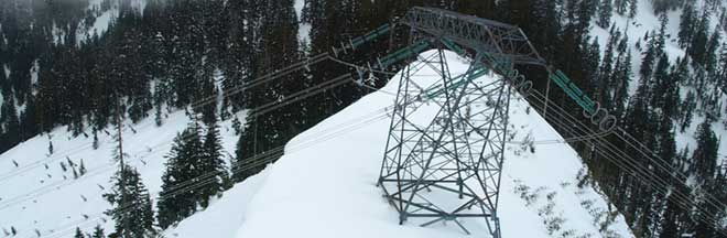 Image of snow-capped peak and transmission tower, Interior to Lower Mainland Transmission Project Image of snow-capped peak and transmission tower, Interior to Lower Mainland Transmission Project