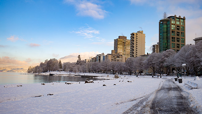 Image of Vancouver's English Bay beach covered in winter snow