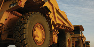 Line of large yellow mining trucks
