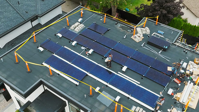 Rooftop work site of a solar panel installation
