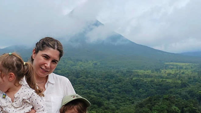 Tugce Conger, climate lead with the City of Abbotsford, poses holding her children during a family trip to Costa Rica