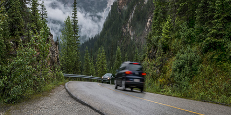 Cars driving on scenic roads