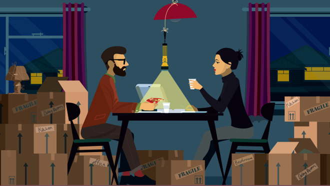 Image of couple surrounded by moving boxes Image of couple surrounded by moving boxes