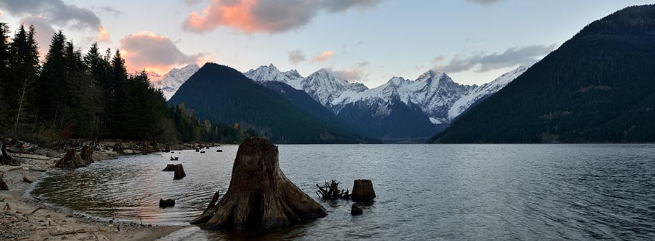 Sun setting behind mountains at Jones Lake Reservoir