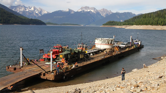 Turbine for Mica Dam loaded onto barge