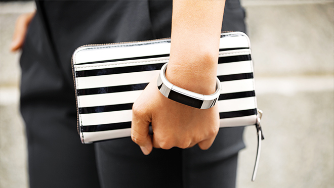 Image of a woman wearing a Fitbit Alta Image of a woman wearing a Fitbit Alta