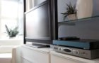 Television with a cable box and PVR in a living room Television with a cable box and PVR in a living room