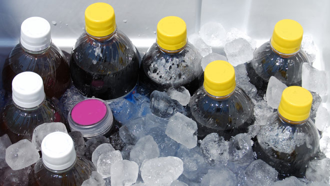 Bottles with ice in cooler Bottles with ice in cooler