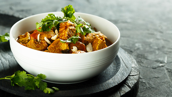 A bowl of tasty curry cooked in a slow cooker