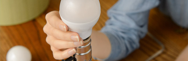installing LED bulb on lamp installing LED bulb on lamp