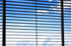 Blue sky through window blinds Blue sky through window blinds