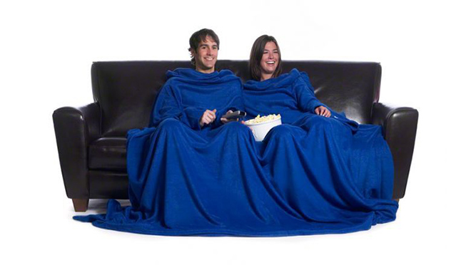 Image of two people using a double slanket Image of two people using a double slanket