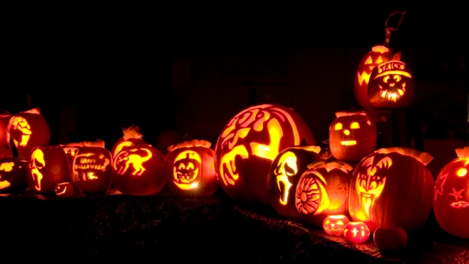 Jack-o-lanterns, lit up at night Jack-o-lanterns, lit up at night