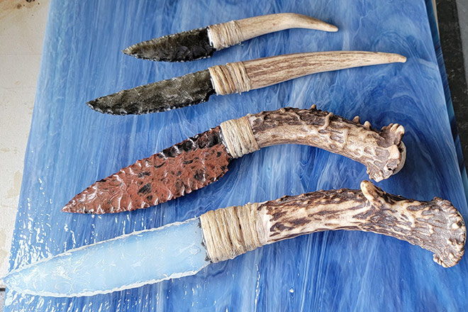 A collection of traditional hunting knives