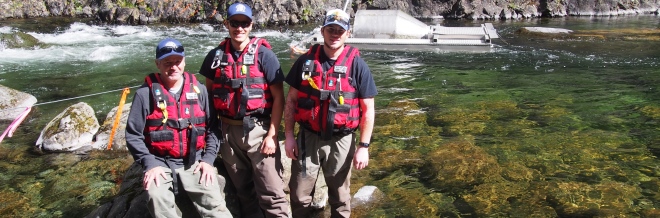 First Nations crew working on Campbell River First Nations crew of Mike Dick, Zach and Jordan Everson pose in front of fish trap on the Campbell River, where they monitor fish and water flows below the John Hart dam on a contract with BC Hydro.
