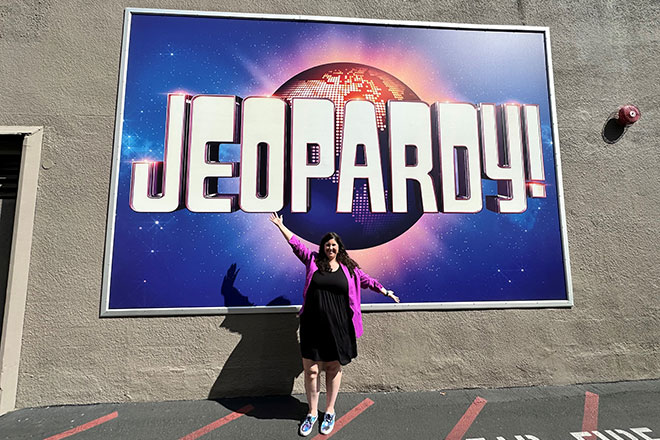 BC Hydro employee and Jeopardy! contestant Chelsea Watt poses outside the Alex Trebek Stage