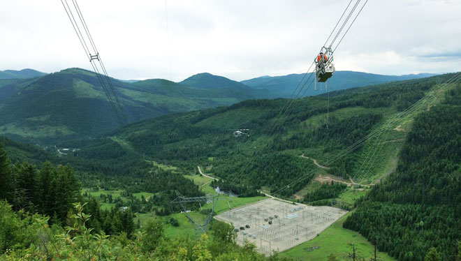 Transmission crews on line over the mountains Cranbrook transmission crews complete complex work.