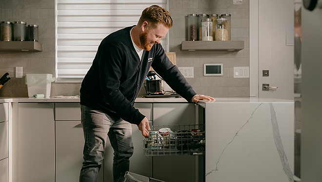 BC Hydro spokesperson Dave loading a dishwasher