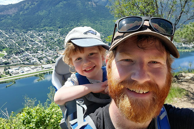 BC Hydro subforeman electrician John Cole and son hiking above Nelson, B.C.
