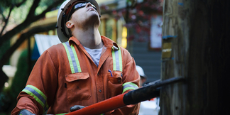 Power line technician at work