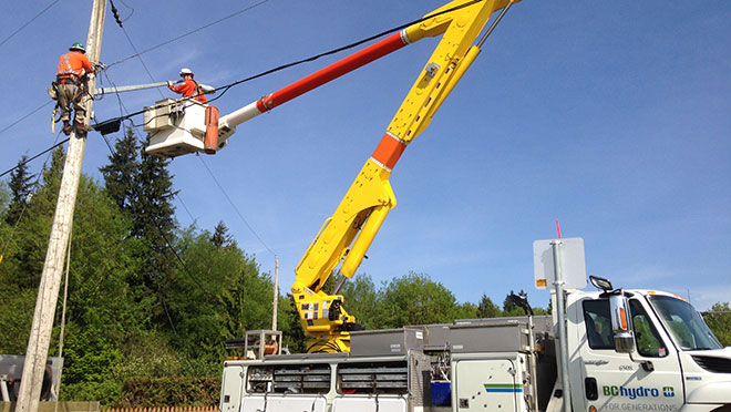 Power line technicians at work