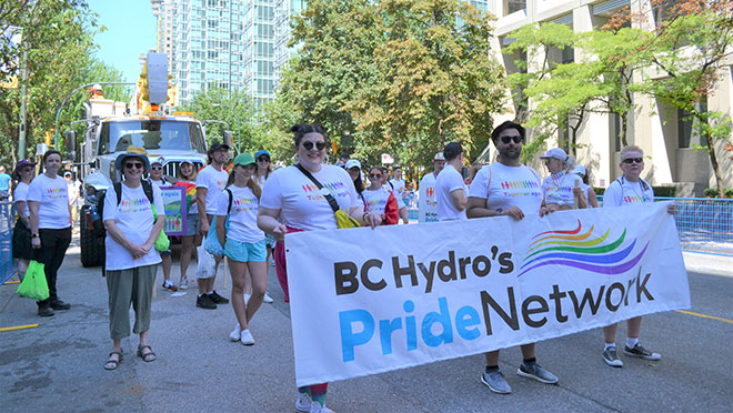 The BC Hydro Pride Network walking in the Vancouver Pride Parade