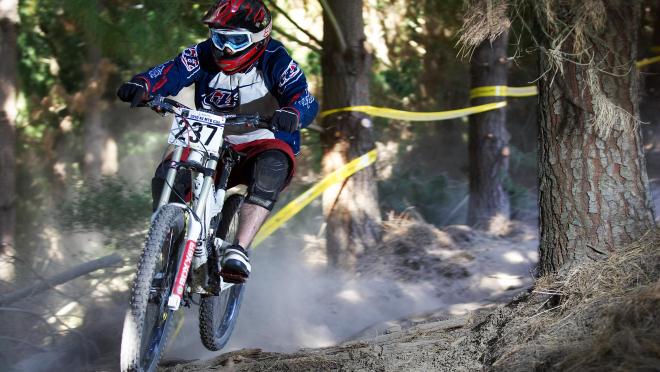 Trevor Scott is an avid mountain biker - shown here during a race in New Zealand Trevor Scott is an avid mountain biker - shown here during a race in New Zealand