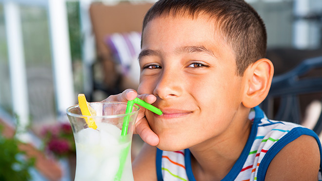Image of boy drinking lemonde Image of boy drinking lemonde