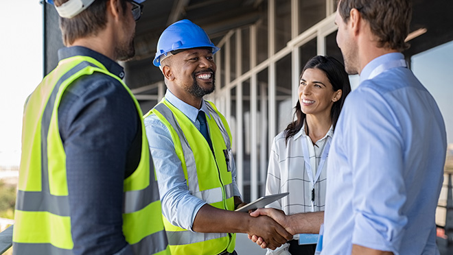 Handshake on a building site