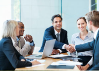 Shaking hands at a meeting in a conference room Shaking hands at a meeting in a conference room