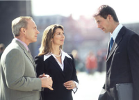Three business people meeting outisde Three business people meeting outisde