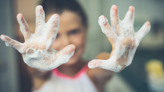 Image of child with soapy hands