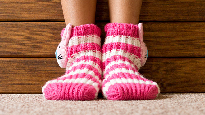 Photo of a child's feet with pink socks Photo of a child's feet with pink socks