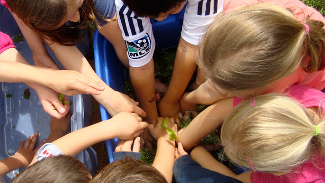 Kids from North Shore Neighbourhood House are learning about food and agriculture thanks to Community Champions. Kids from North Shore Neighbourhood House are learning about food and agriculture thanks to Community Champions.