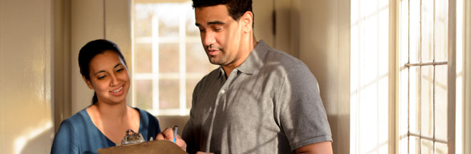 Image of two people during a home evaluation