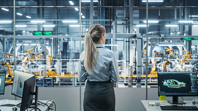 Car Factory Office: Woman Overlooking Factory Production Conveyor Car Factory Office: Woman Overlooking Factory Production Conveyor