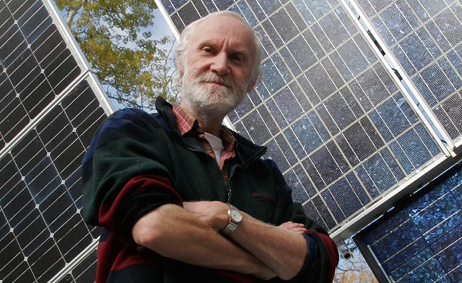 don-pettit-dawson-creek-solar-panels-full-size.jpg Don Pettit poses with solar panels he purchased for his home in the 1980s.