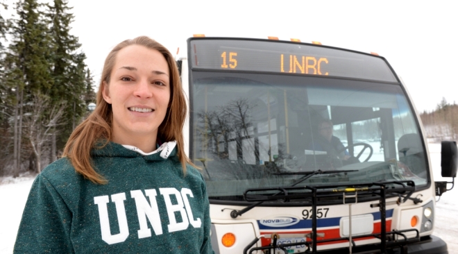 eryn-beddoes-unbc-bus-people-full-width.jpg University of Northern B.C. student Eryn Beddoes stands alongside bus at the Prince George university