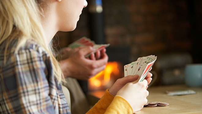 Image of young girl playing cards Image of young girl playing cards