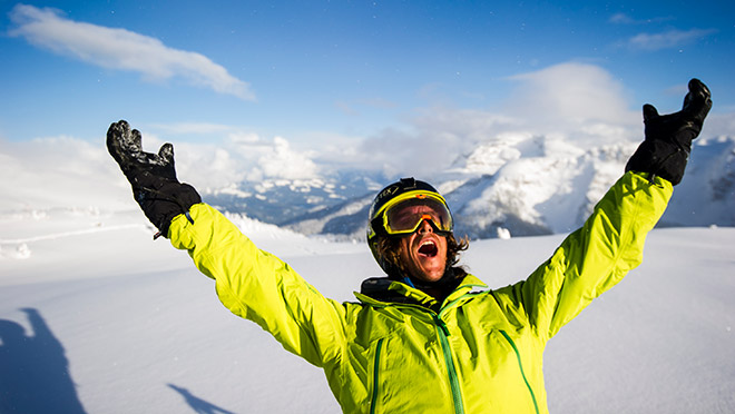 Image of Greg Hill on a mountaintop. Photo by Bruno Long.