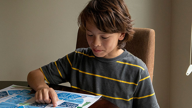 Image of boy studying at home