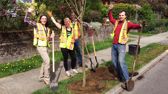 Image of people planting trees as part of the Community ReGreening program Image of people planting trees as part of the Community ReGreening program