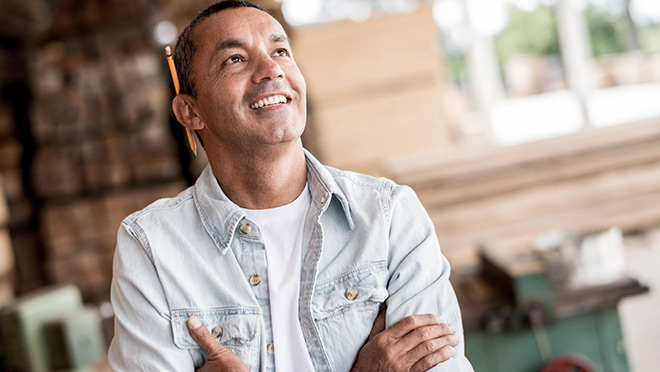 Image of a smiling business owner Image of a smiling business owner