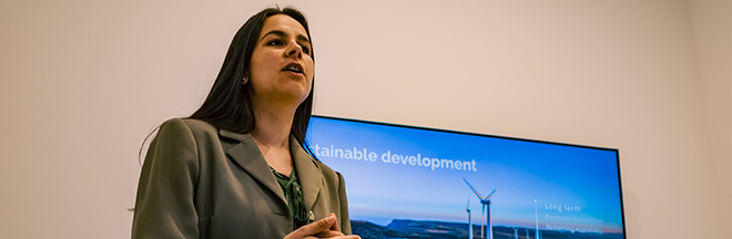 Woman presenting at a meeting